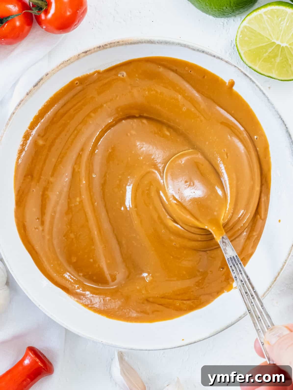 Delicious Peanut Sauce 2 creamy peanut sauce in a bowl