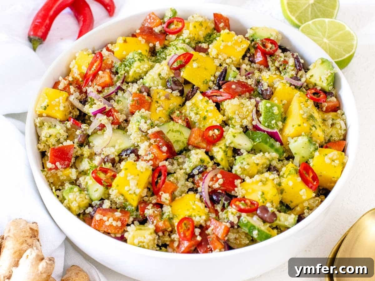 Zesty Black Bean Mango Medley 3 Close-up of Black Bean Mango Quinoa Salad with creamy avocado and fresh herbs