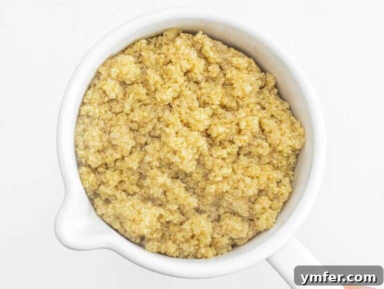 Cooked quinoa in a white pot