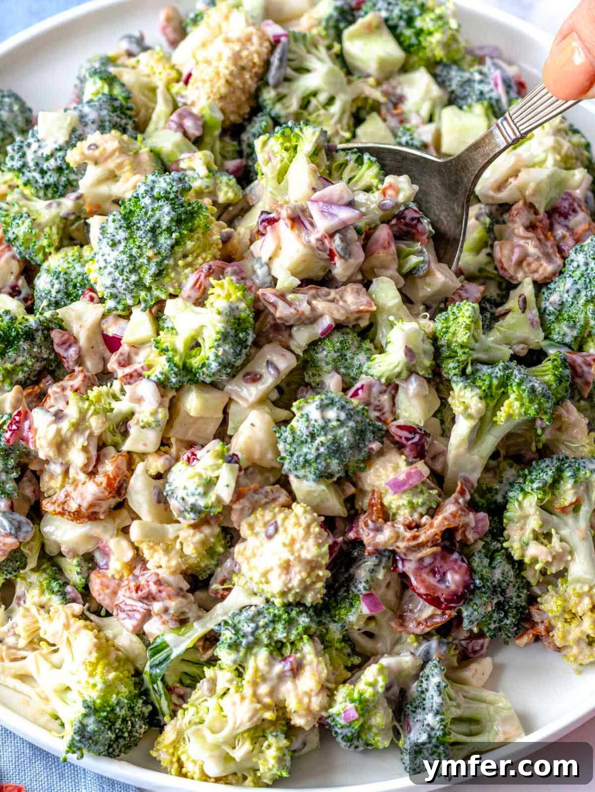 Creamy Broccoli Delight 2 Broccoli Salad on a serving platter, showcasing its vibrant green color and creamy texture.