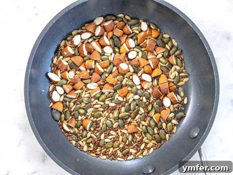 Creamy Broccoli Delight 9 toasted almonds and seeds in a pan