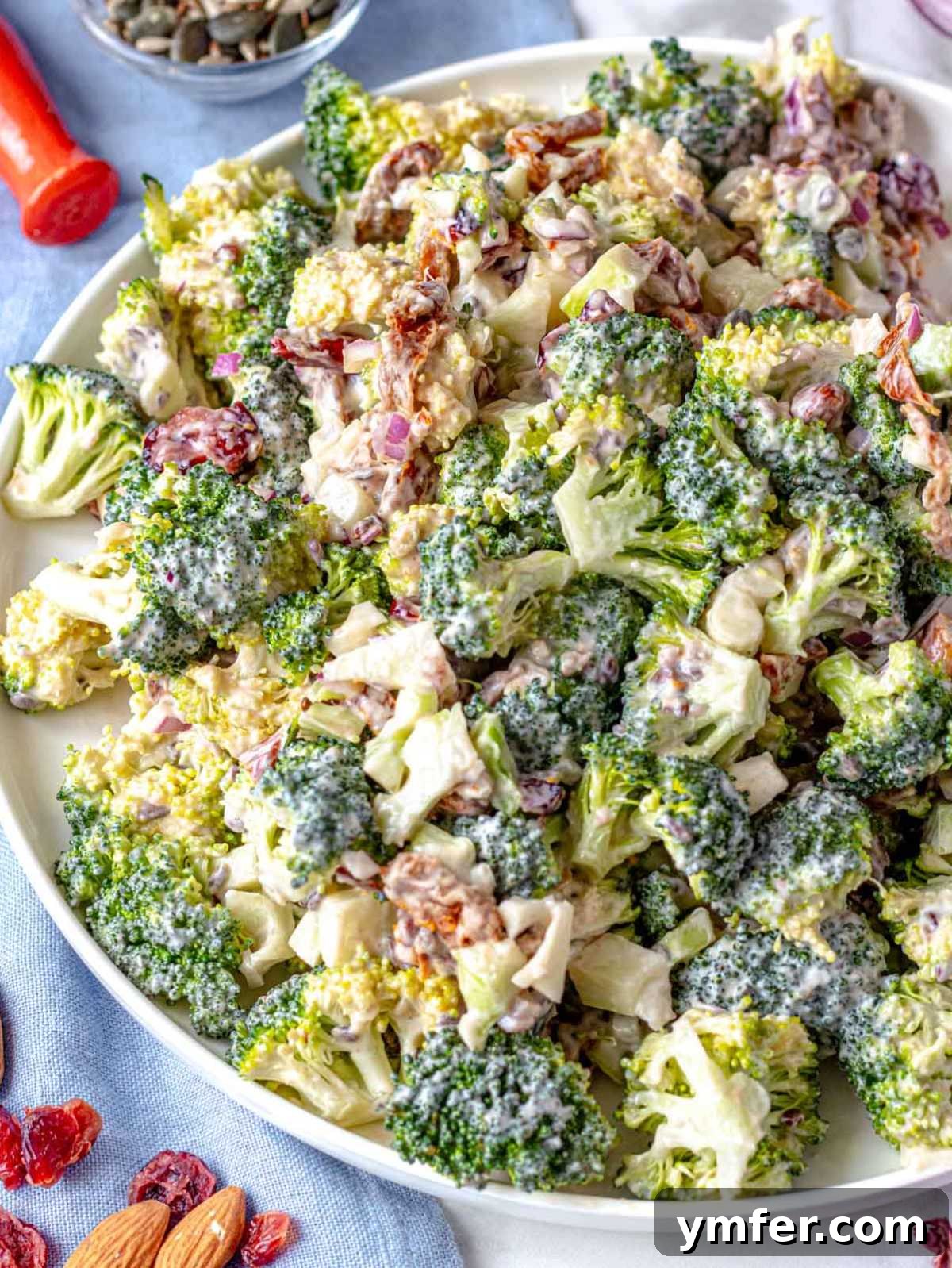 Creamy Broccoli Delight 6 Healthy broccoli salad recipe presented on a white platter.