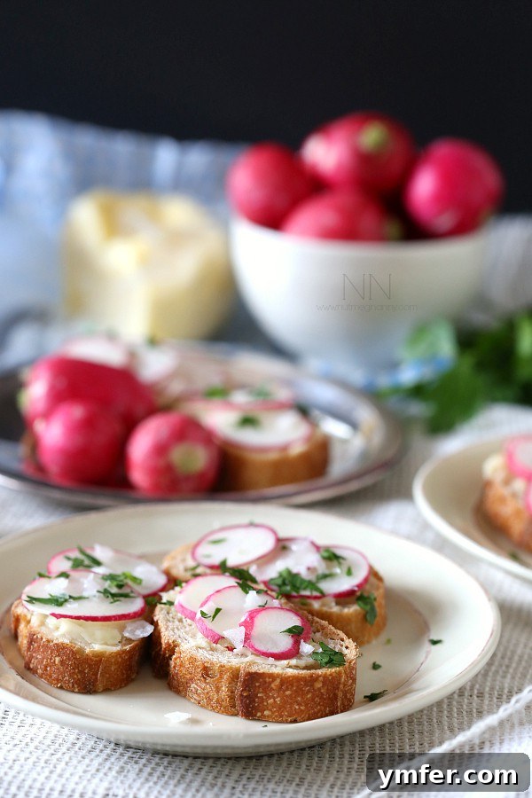 Radish and Butter Bites by Nutmeg Nanny Close-up of Radish and Butter Bites on a Wooden Board