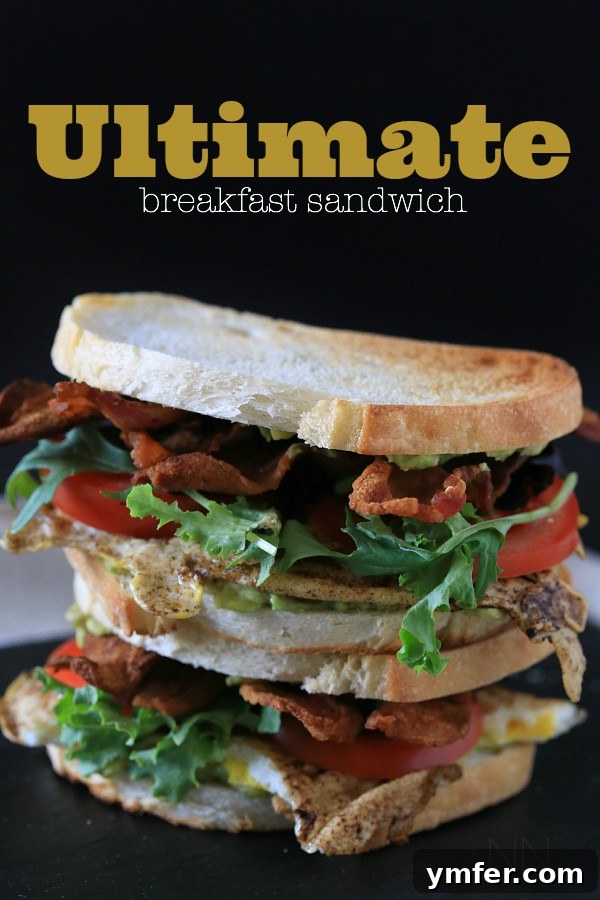 The Ultimate Breakfast Sandwich by Nutmeg Nanny Stacked Ultimate Breakfast Sandwich with fresh ingredients