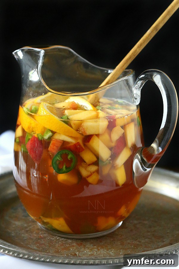 Teafu by Dreamfarm brewing loose leaf hibiscus peach tea for sangria