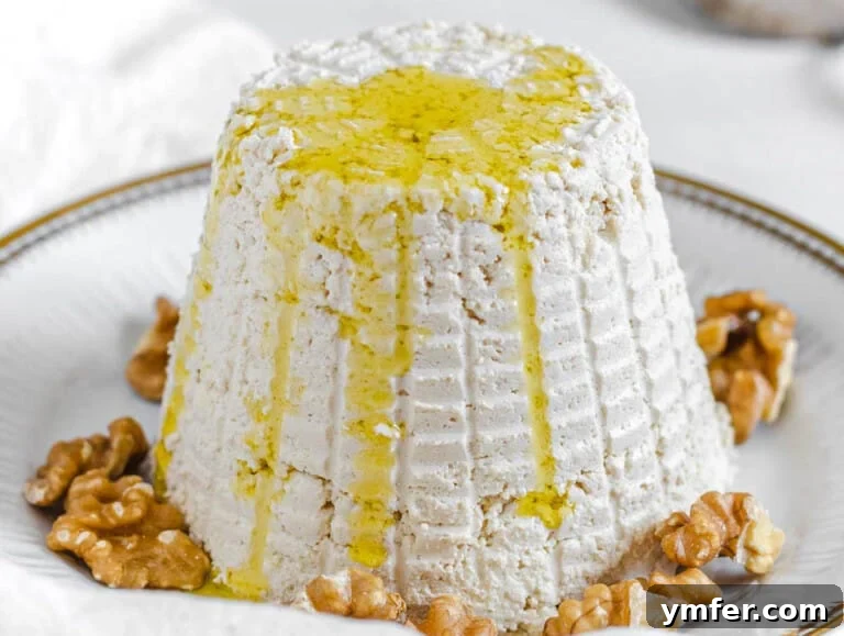 Creamy Vegan Ricotta 32 A freshly molded dairy-free ricotta cheese, ready to be stored or served.