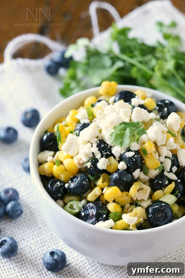 Fresh Corn and Blueberry Salad Close-up of a bowl of Corn Blueberry Salad, showcasing its fresh ingredients and vibrant colors