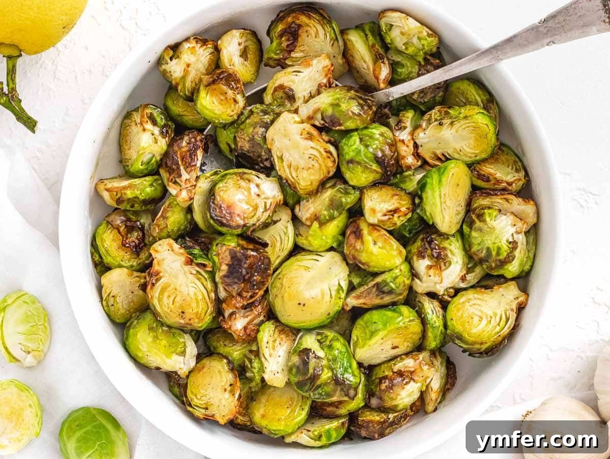 Nourishing Plant Power Meals 16 Crispy air fryer Brussels sprouts with a drizzle of honey mustard dressing