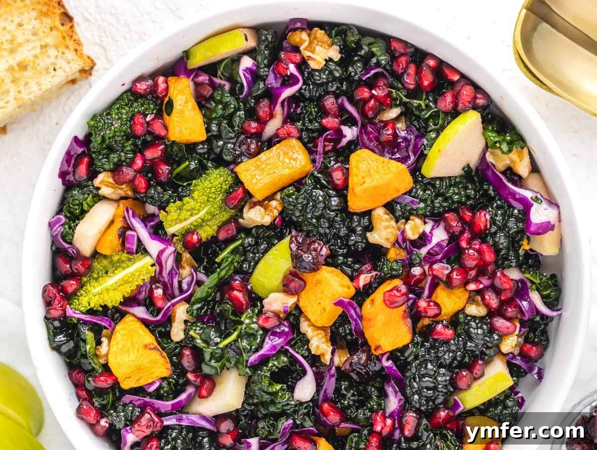 Nourishing Plant Power Meals 18 Healthy kale salad adorned with bright pomegranate seeds