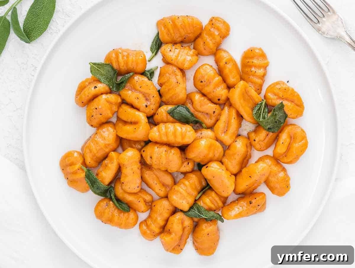 Nourishing Plant Power Meals 21 Delicious butter and sage sweet potato gnocchi served on a plate