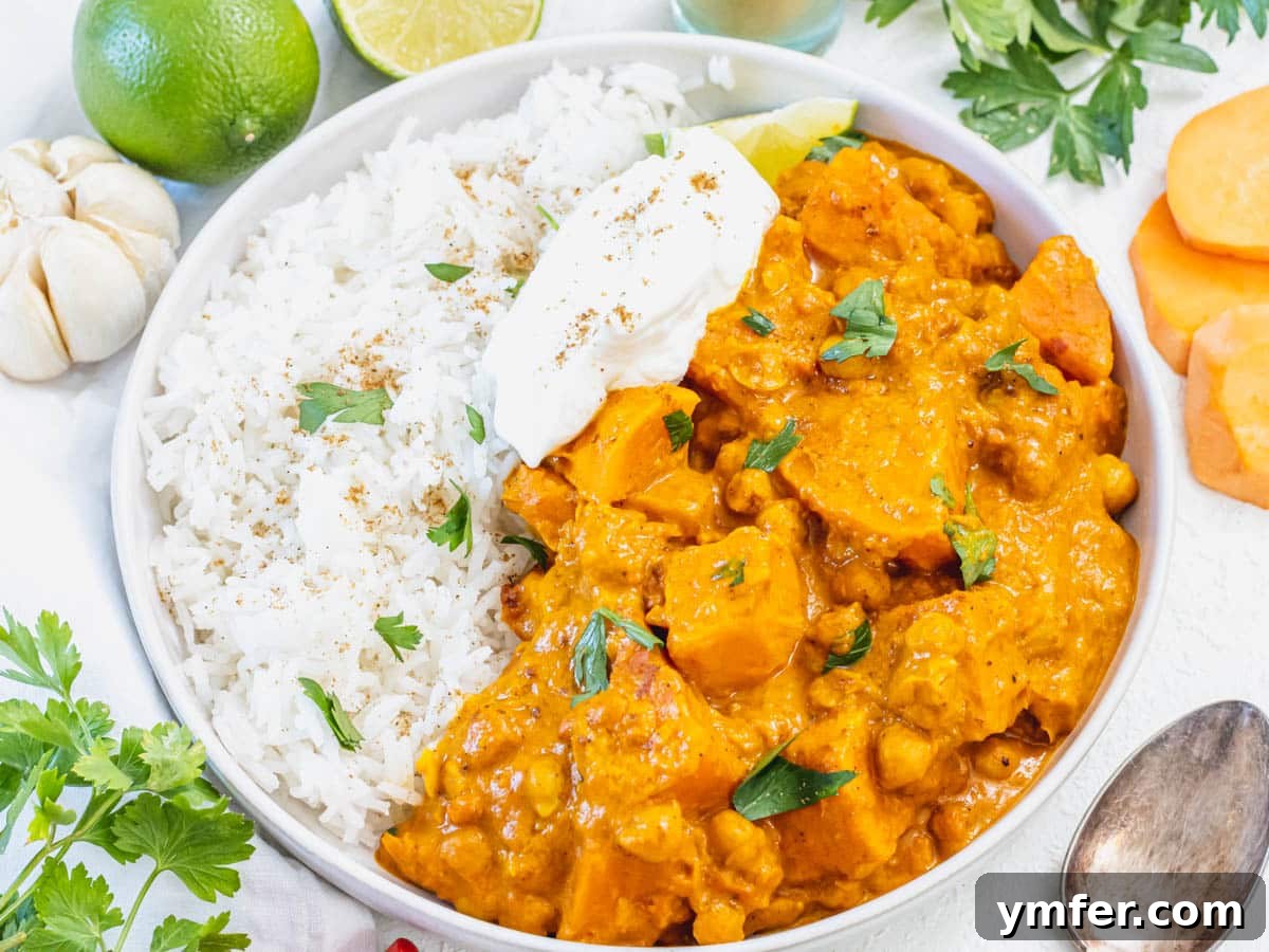 Nourishing Plant Power Meals 5 Hearty sweet potato curry served with white rice and a dollop of yogurt