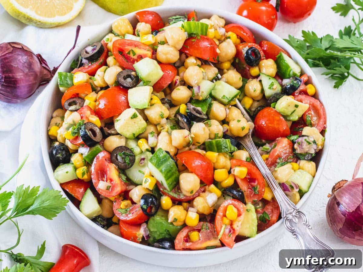 Nourishing Plant Power Meals 8 Simple and fresh chickpea salad with a silver fork