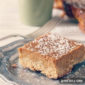 These pumpkin pie cake bars are like two desserts in one. Cake like bottom topped with a moist pumpkin pie top sprinkled with powdered sugar. Perfect for Thanksgiving!