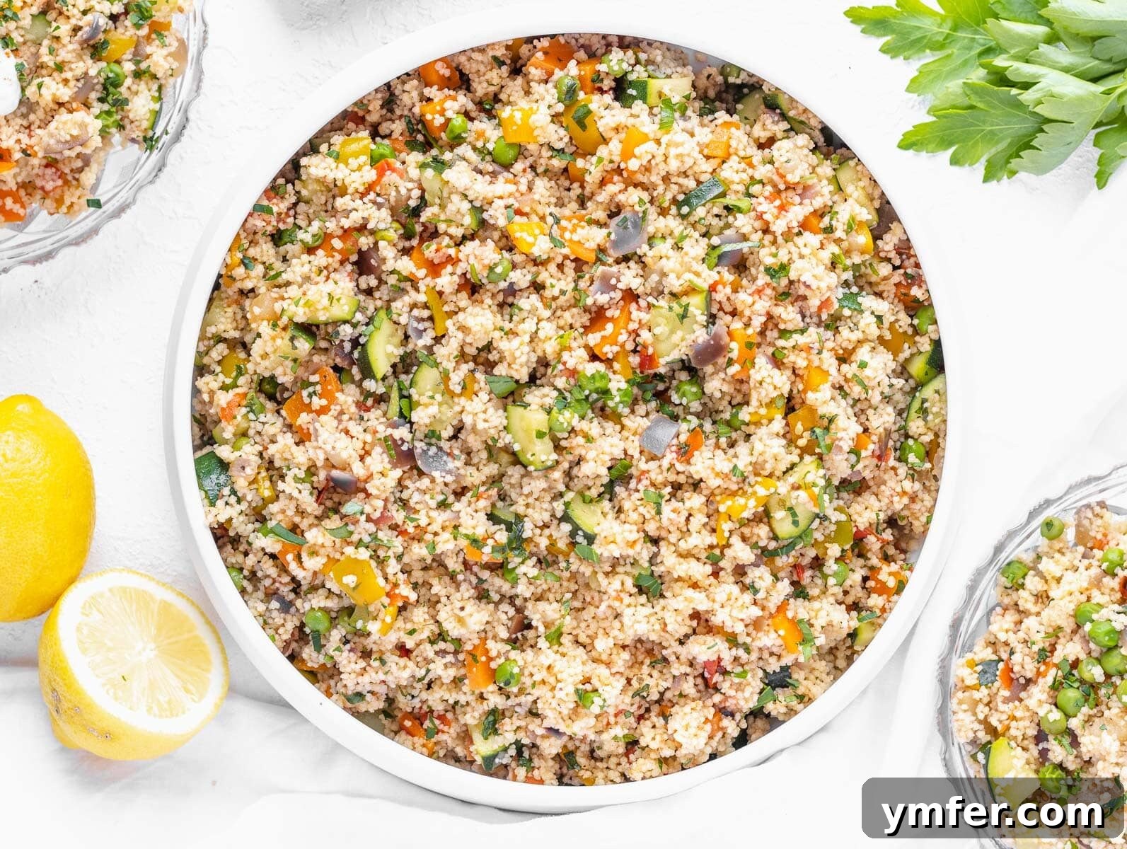 Streamline Your Week with Vegetarian Meal Prep 5 Fluffy couscous mixed with a colorful array of roasted vegetables, making for a healthy and satisfying meal prep dish.
