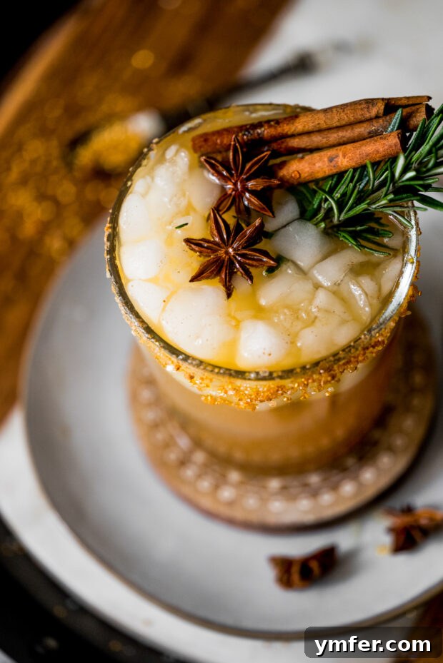Crisp Honeycrisp Sangria 3 Honeycrisp Apple Sangria garnished with whole spices.
