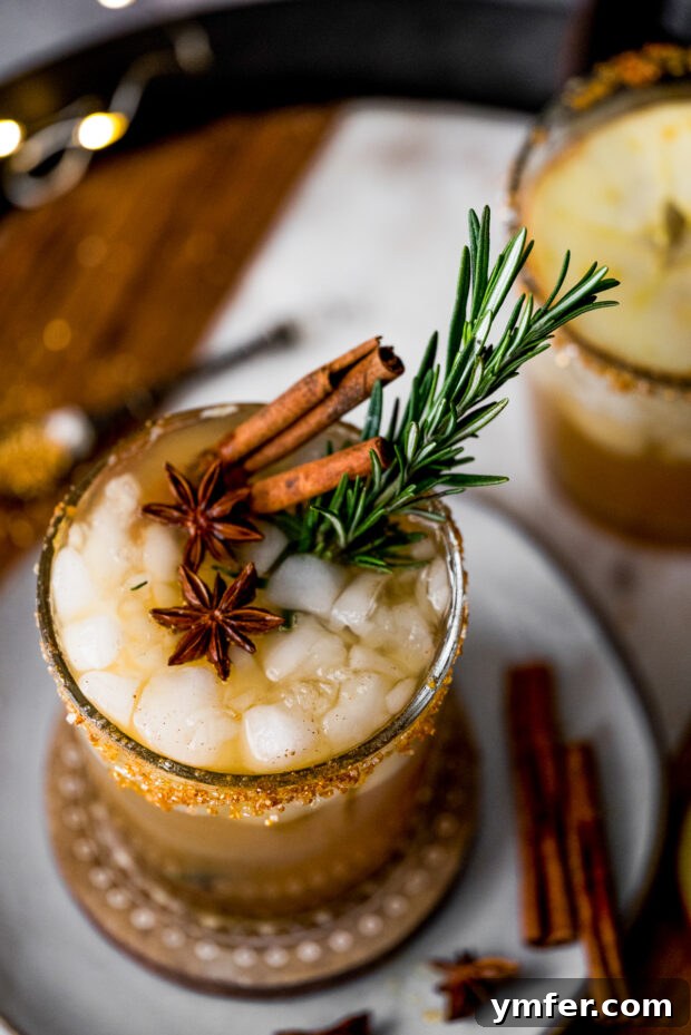 Crisp Honeycrisp Sangria 5 Honeycrisp Apple Sangria garnished with cinnamon sticks.