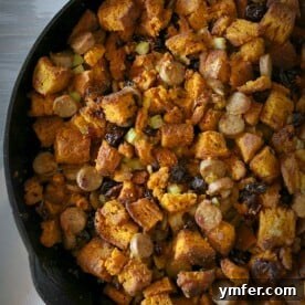 Spiced Pumpkin Cornbread Dressing 2 This pumpkin cornbread chicken sausage stuffing is packed full of homemade pumpkin sage cornbread croutons, chicken sausage and dried cherries. Perfect for Thanksgiving!