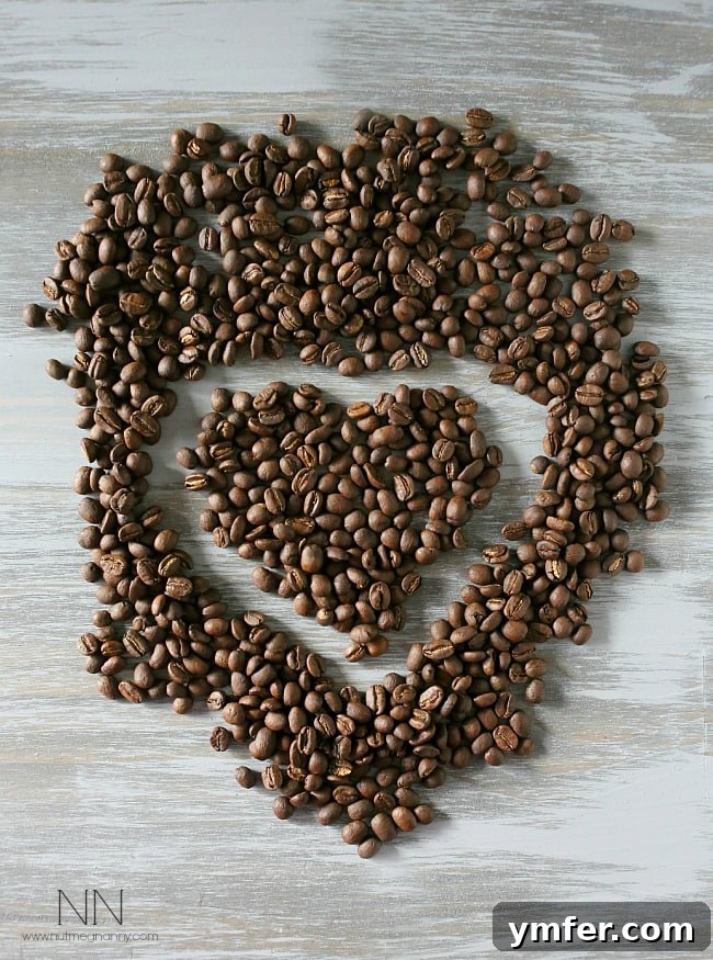 Coffee beans shaped into a heart. Heart shape made from coffee beans on a rustic wooden table, symbolizing love for coffee and cocktails.