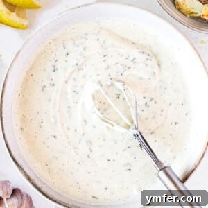 Creamy Vegan Ranch 13 vegan ranch dressing in a white bowl