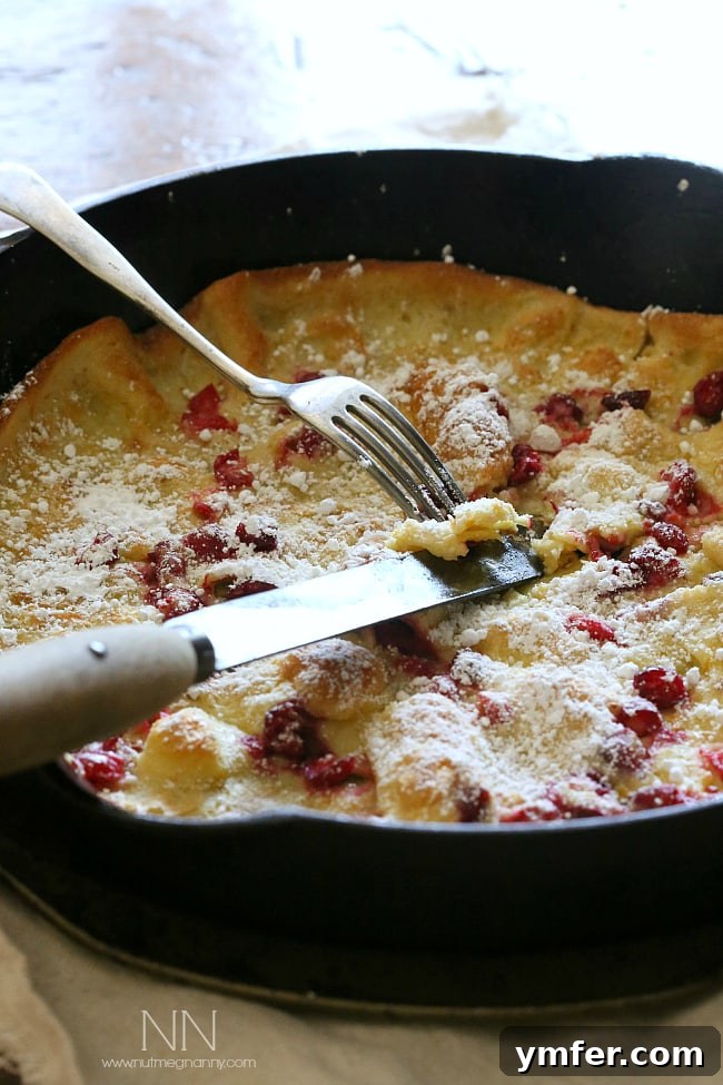 Festive Cranberry Orange Dutch Baby This cranberry orange Dutch baby is the highlight of your holiday season eating. Full of tart fresh cranberries and zesty orange flavor. Say hello to delicious!