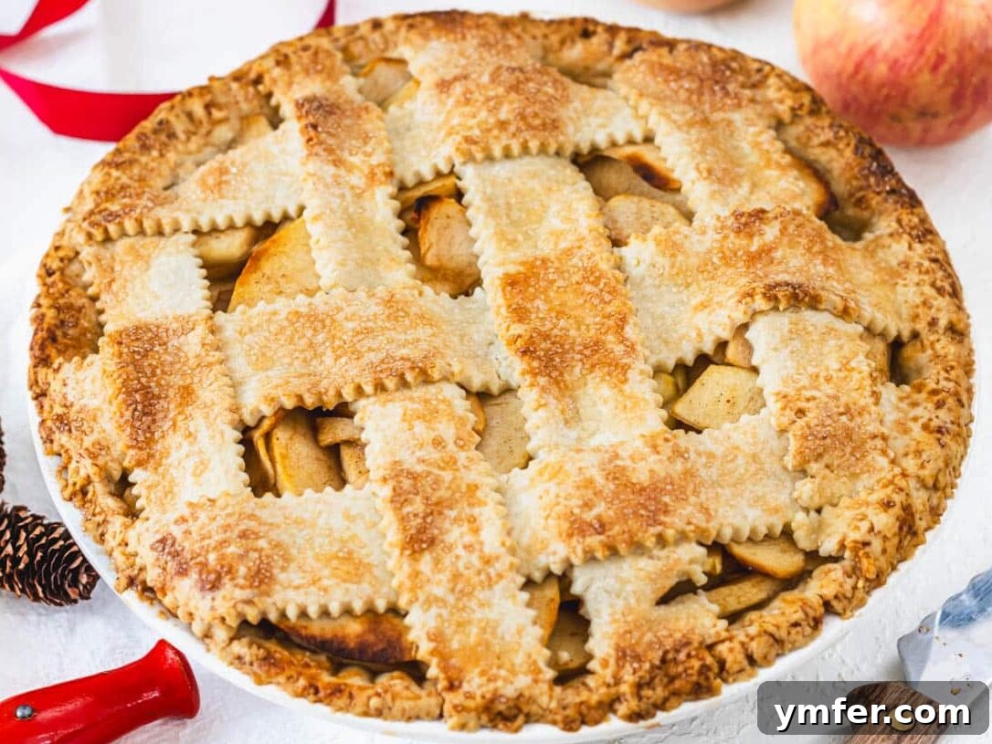 The Ultimate Vegetarian Thanksgiving Feast: 35 Recipes 33 Vegan apple pie with knife and red ribbon