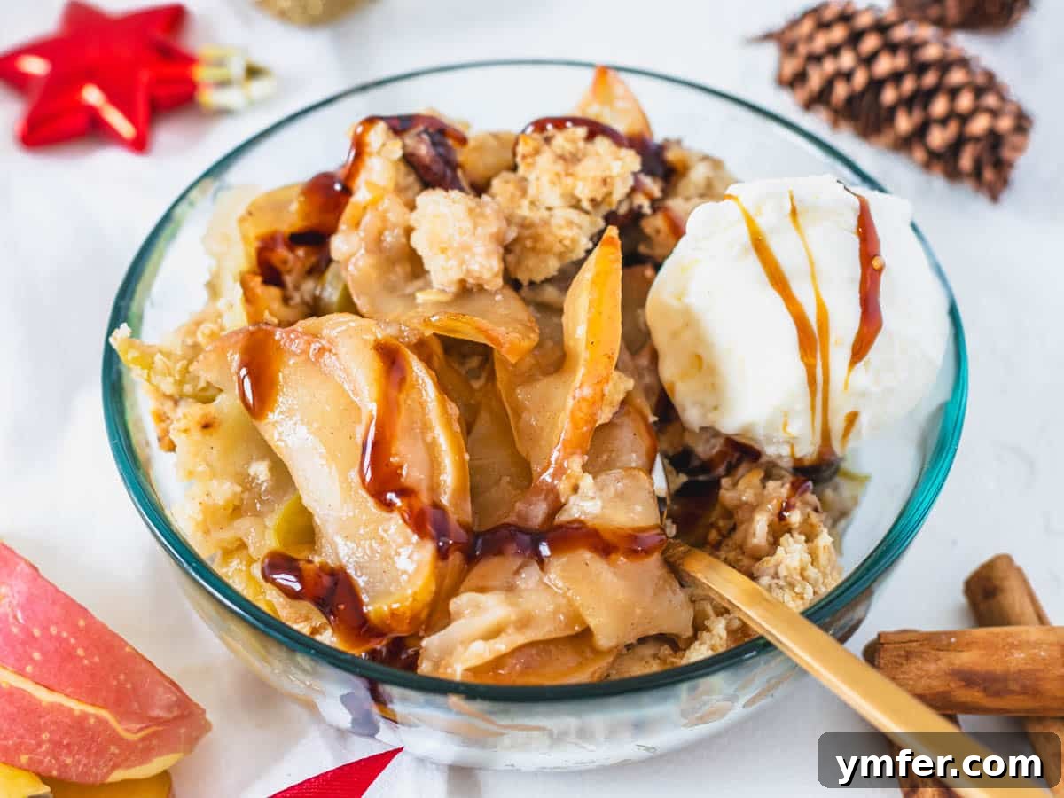 Plant-Based Apple Crumble 14 Vegan apple crisp drizzled with caramel sauce, ready to be enjoyed