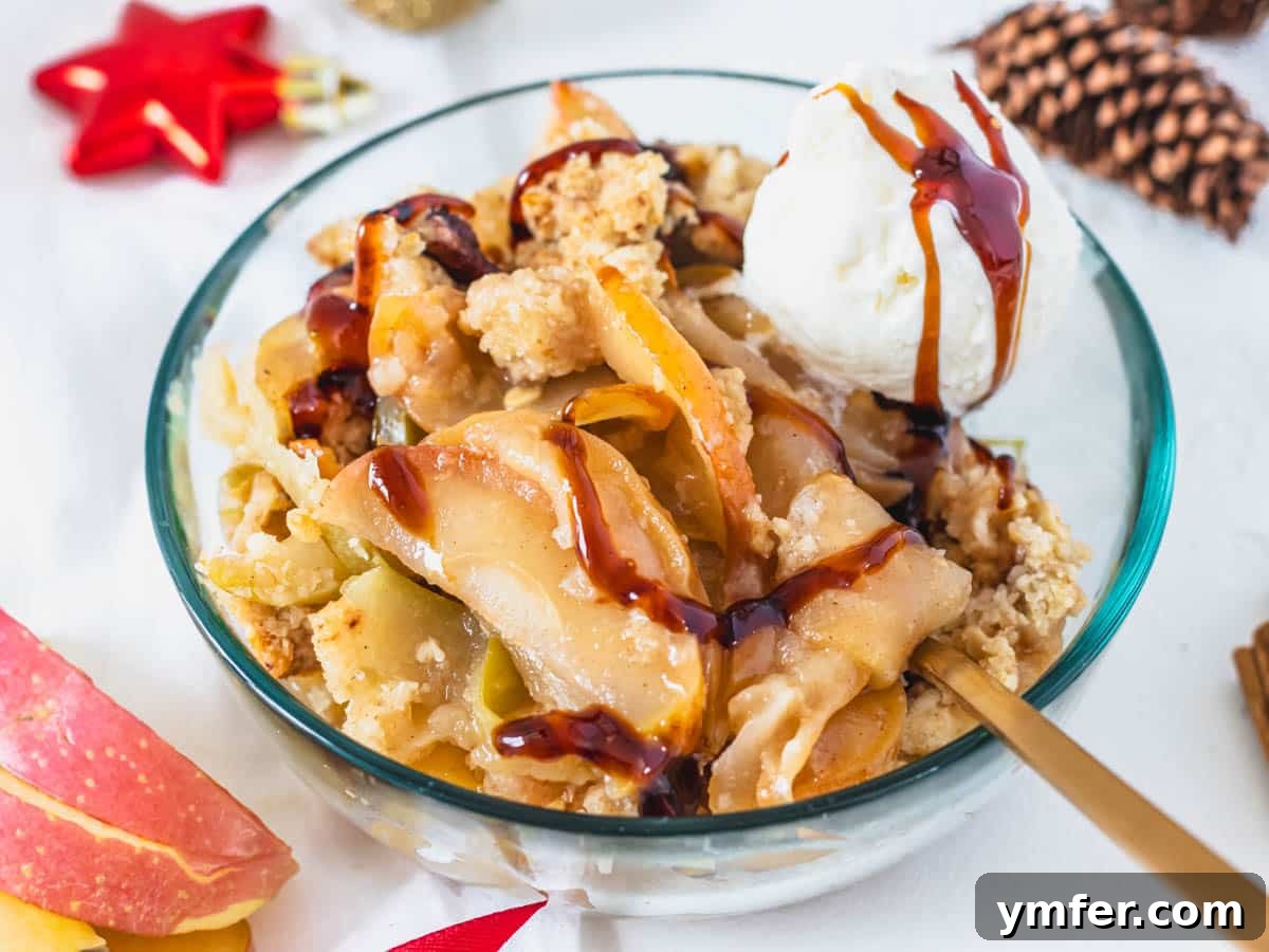 Plant-Based Apple Crumble 5 Vegan apple crisp served in a bowl with a scoop of vanilla ice cream