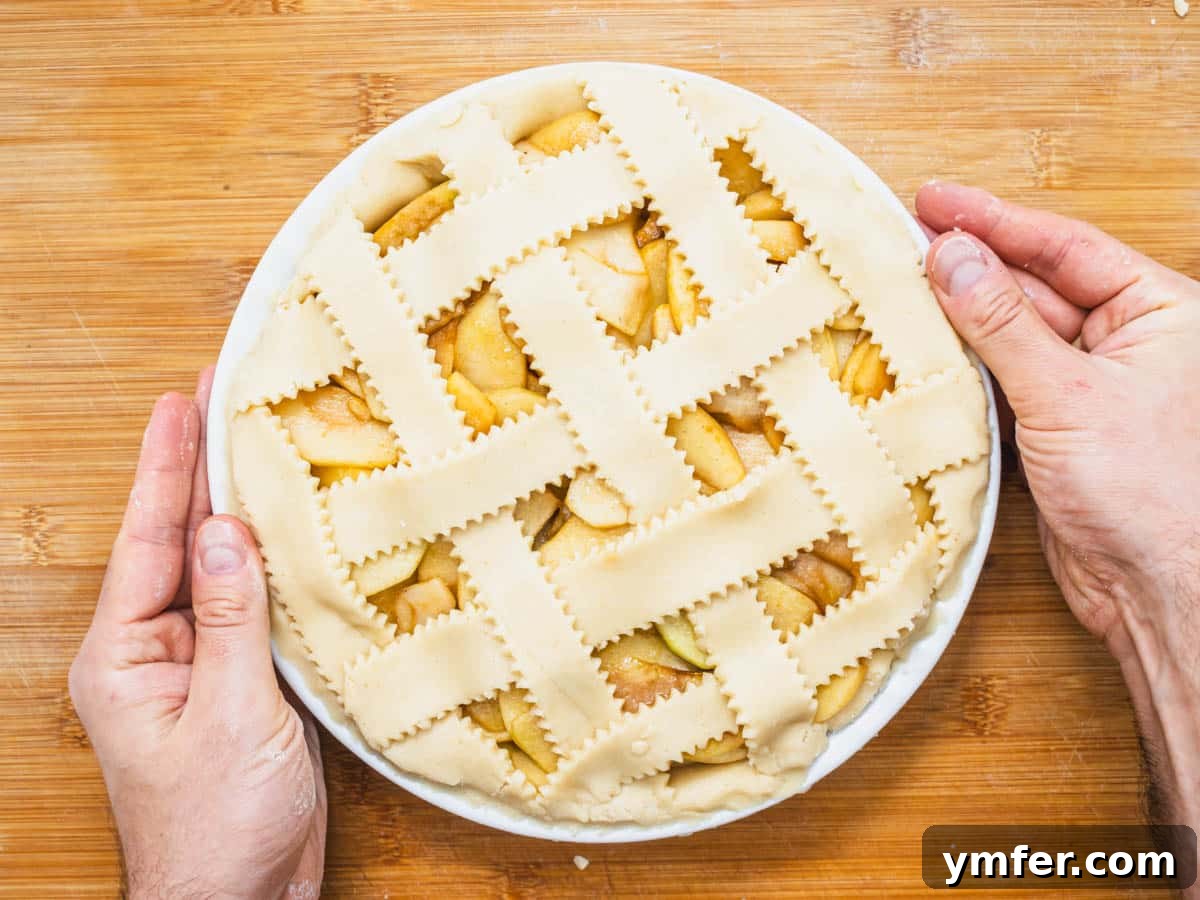 Plant-Based Apple Perfection 13 vegan apple pie with hands before baking