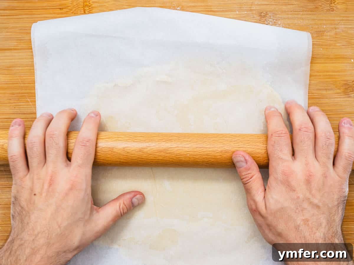 Plant-Based Apple Perfection 8 hands with a rolling pin and vegan pie crust