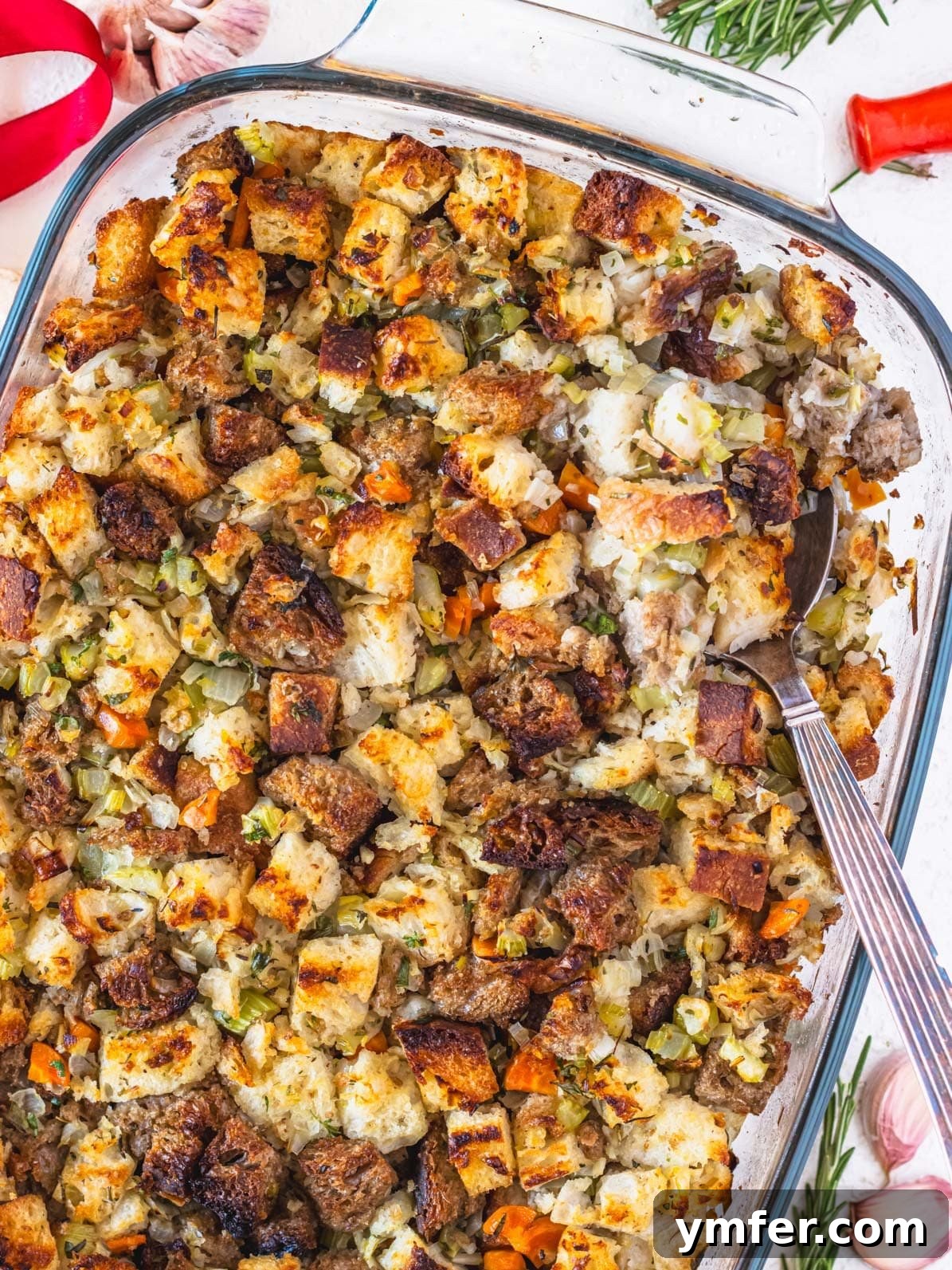 Savory Plant-Based Dressing 2 Vegetarian stuffing in a casserole with silver spoon
