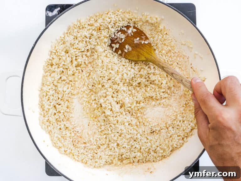 rice and onions in a skillet