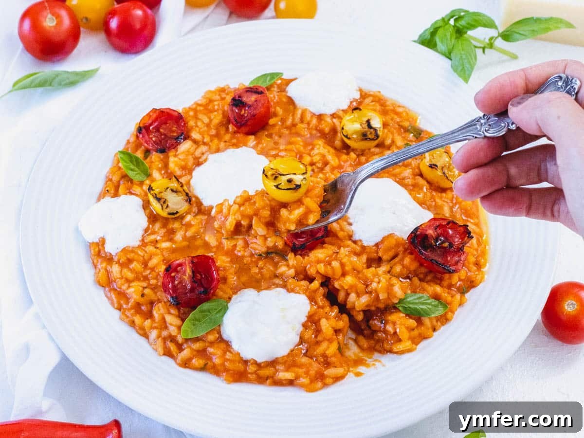 Sun-Kissed Tomato Risotto 5 Tomato risotto recipe with burrata and a fork