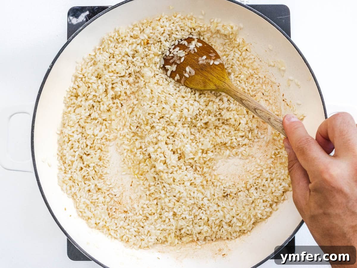Sun-Kissed Tomato Risotto 6 rice and onions in a skillet