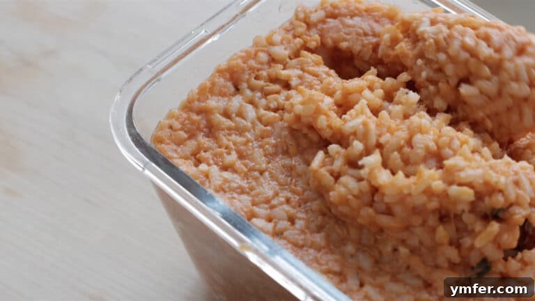 Roman Supplì 7 Step-by-step image showing how to take a spoonful of risotto for supplì.