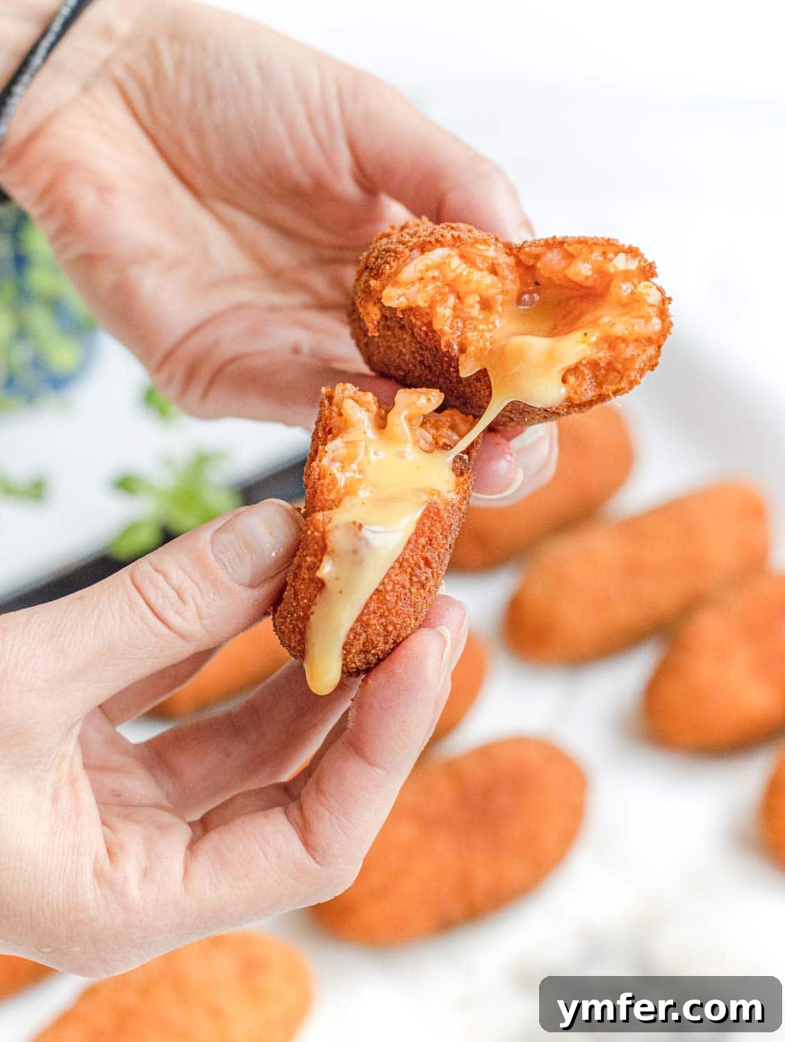Roman Supplì 4 Beautifully golden Italian deep-fried rice balls, showcasing a melted cheese core