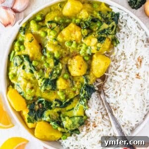 Delicious and creamy Potato Curry recipe, garnished and ready for serving.