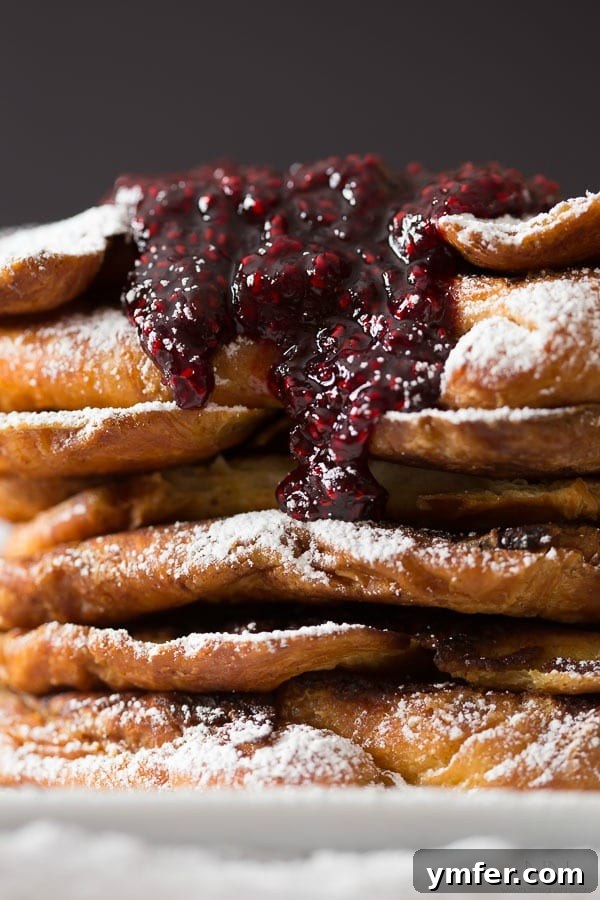 Decadent Amaretto Raspberry Croissant French Toast 4 stack of croissant french toast.