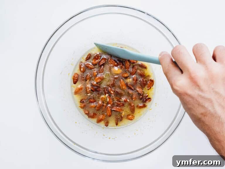 Almonds added to liquid ingredients in a bowl