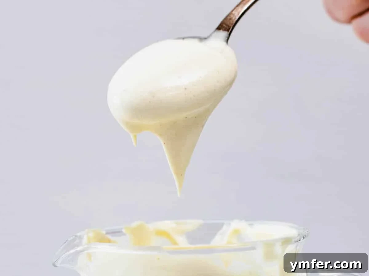 Egg-Free Delights 7 Creamy vegan mayonnaise on a spoon