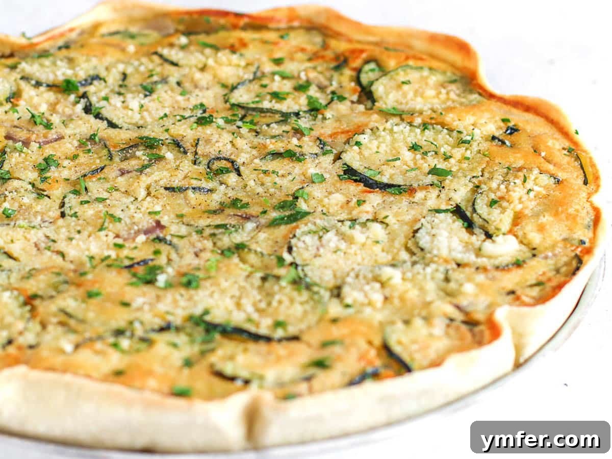 Egg-Free Delights 10 Slice of vegan zucchini pie on a white plate