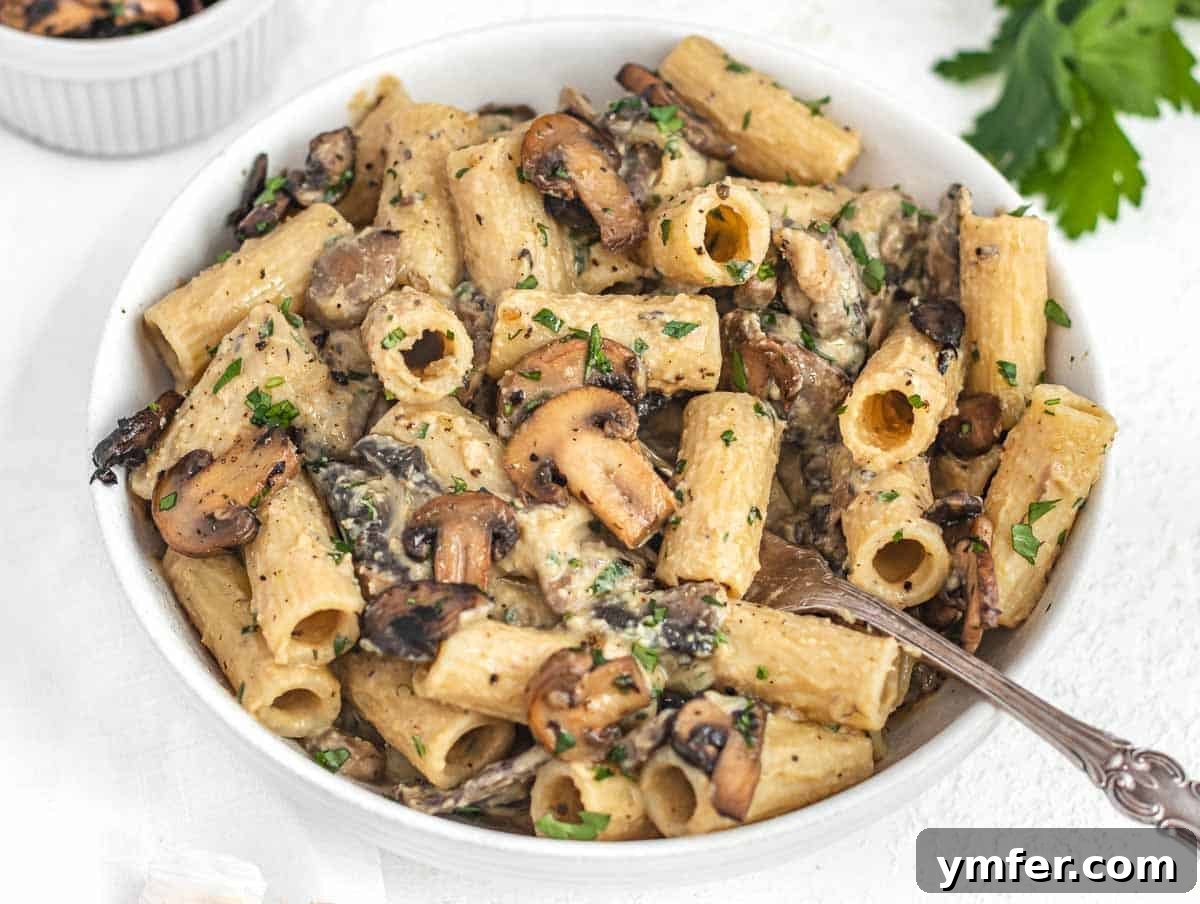 30 Plant-Based Protein Power Meals 22 Hummus Pasta and fork