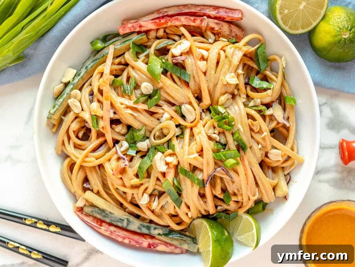 30 Plant-Based Protein Power Meals 29 Peanut noodles with toasted peanuts and lime in a bowl