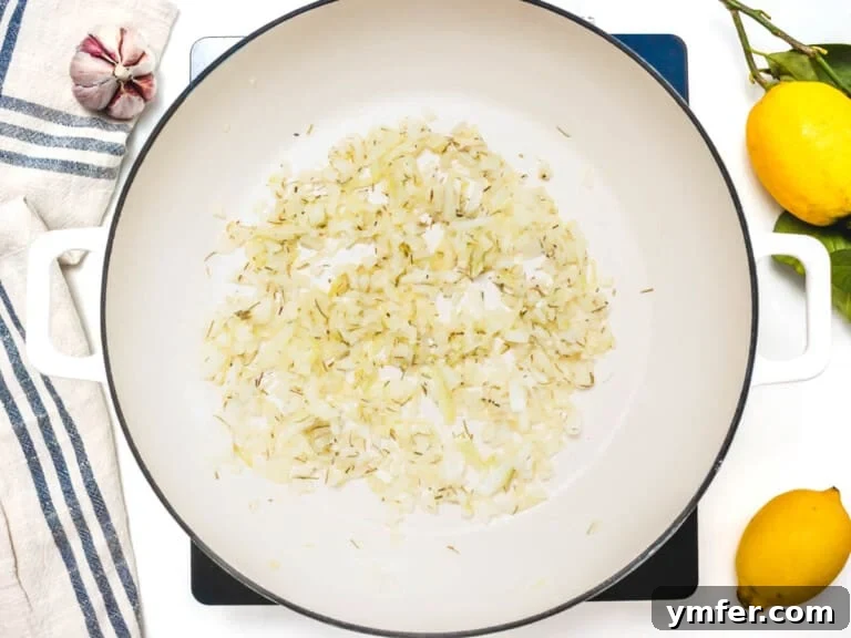 white skillet with garlic and spices