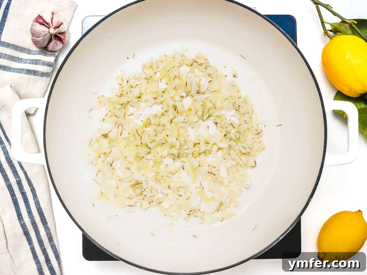white skillet with garlic and spices