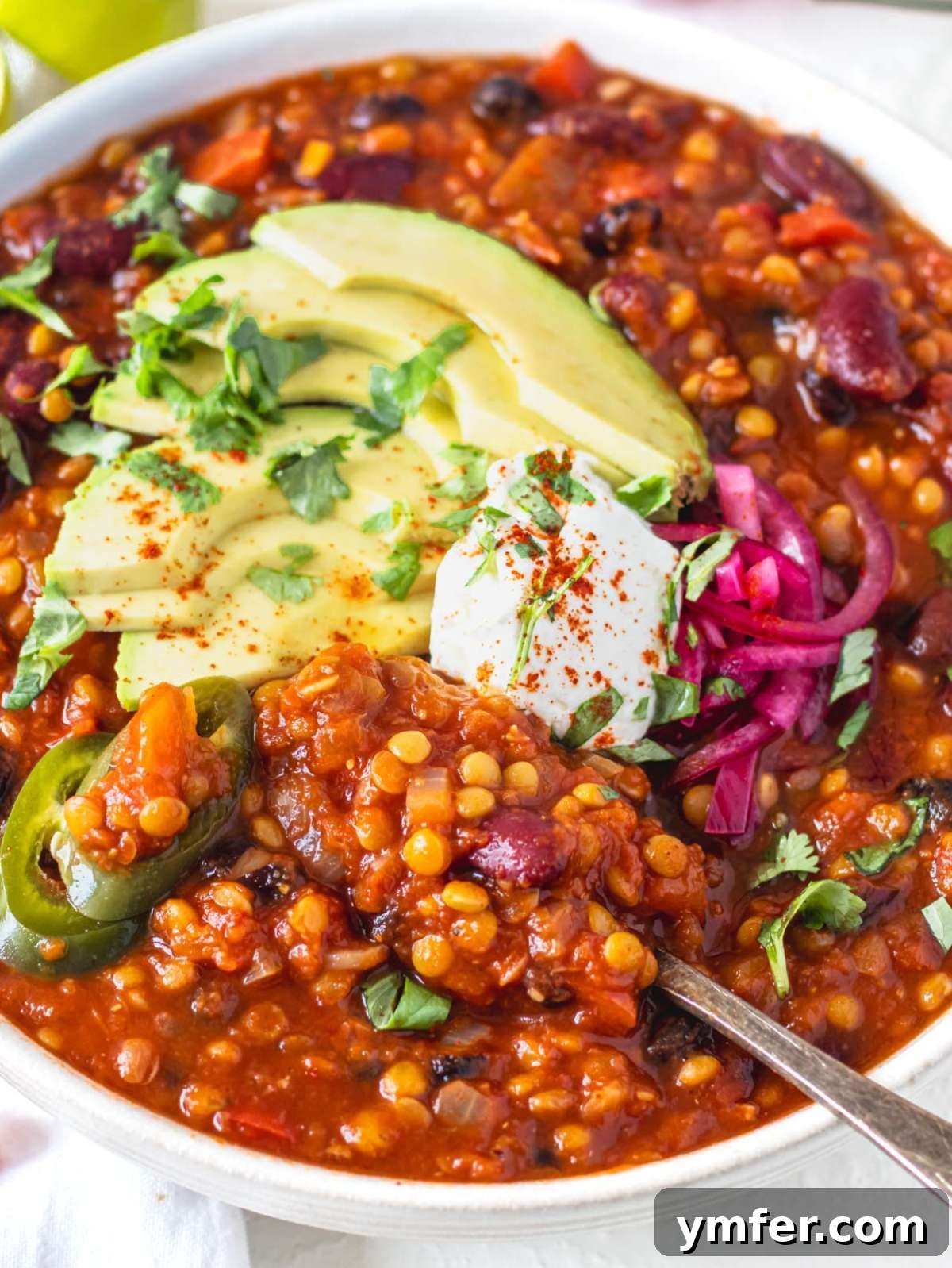 Hearty Lentil Chili 6 A vibrant bowl of lentil chili, ready to be enjoyed.