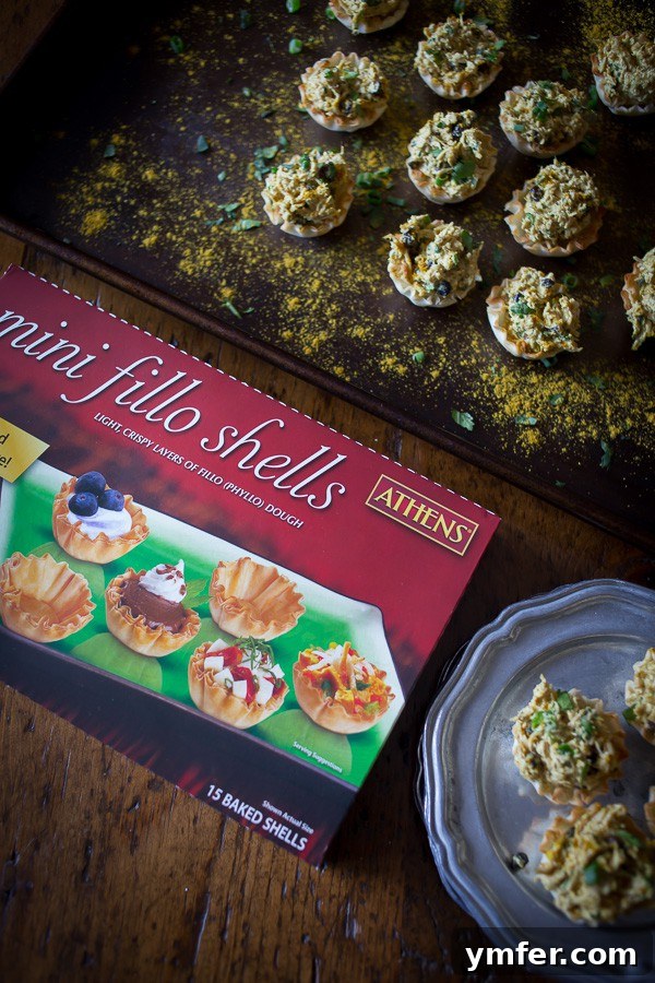Golden Curry Chicken Salad Phyllo Tartlets 3 These little curried chicken salad phyllo cups are packed full of Greek yogurt, curry spice, cilantro and green onions. Then it's all packed into a crunchy phyllo cups for the perfect party appetizer. So simple and so easy!