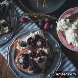 This roasted grape crostini is flavored with fresh thyme and piled high on top of ricotta toast. It's a sweet and savory appetizer that's perfect anytime of the year.
