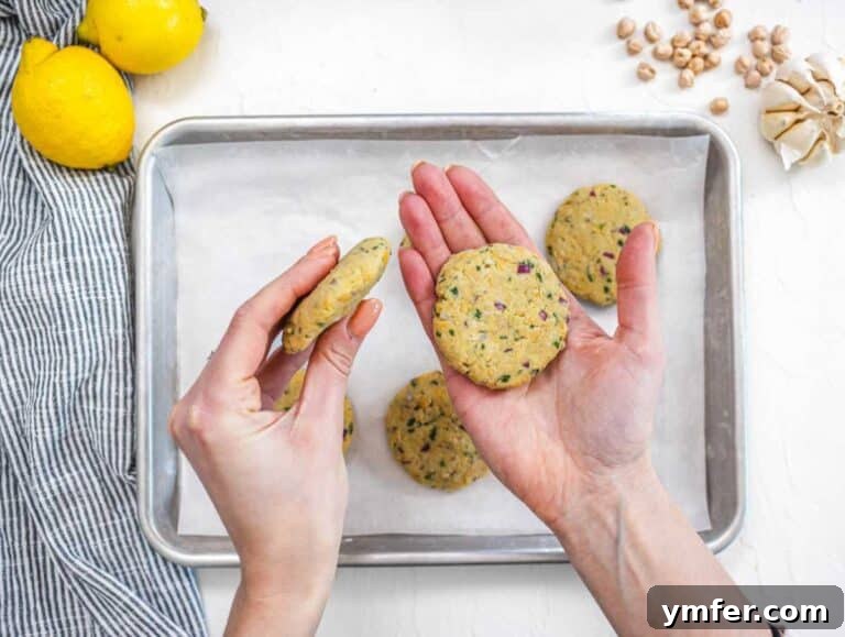 Shaping the mixture into patties.