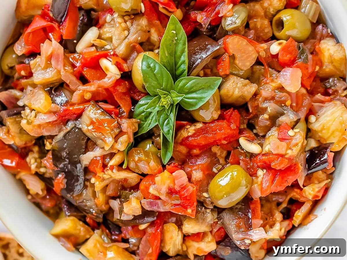 Simple Celery Recipes 16 Rich and savory Eggplant Caponata served in a rustic bowl.