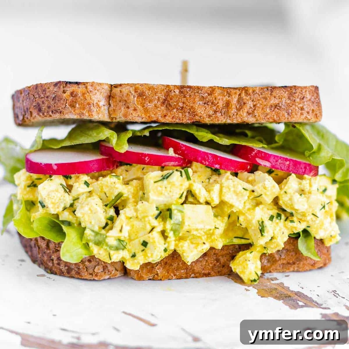 Simple Celery Recipes 23 Flavorful vegan egg salad made with tofu, served enticingly in a sandwich.